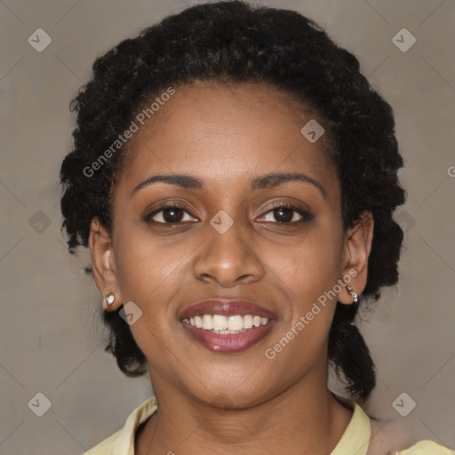 Joyful black young-adult female with medium  brown hair and brown eyes