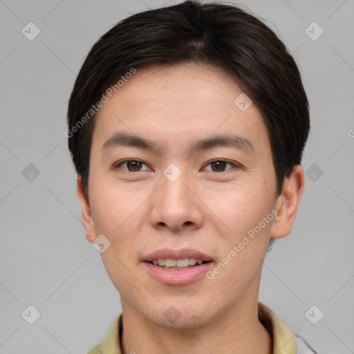 Joyful asian young-adult male with short  brown hair and brown eyes