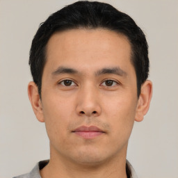 Neutral asian young-adult male with short  black hair and brown eyes