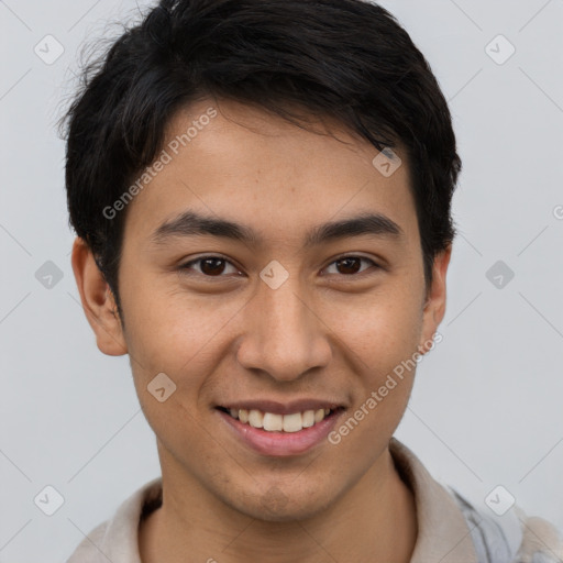 Joyful latino young-adult male with short  brown hair and brown eyes