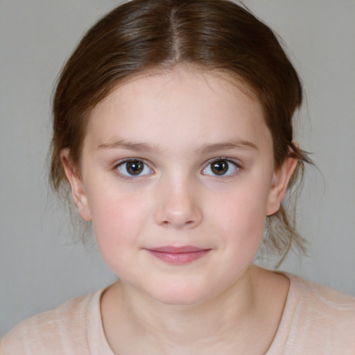 Joyful white child female with medium  brown hair and brown eyes