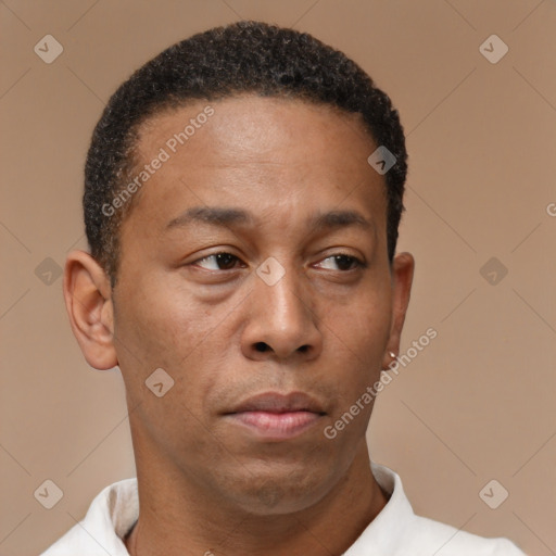 Neutral latino young-adult male with short  brown hair and brown eyes