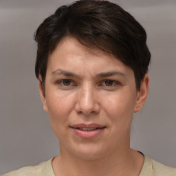 Joyful white adult female with short  brown hair and brown eyes