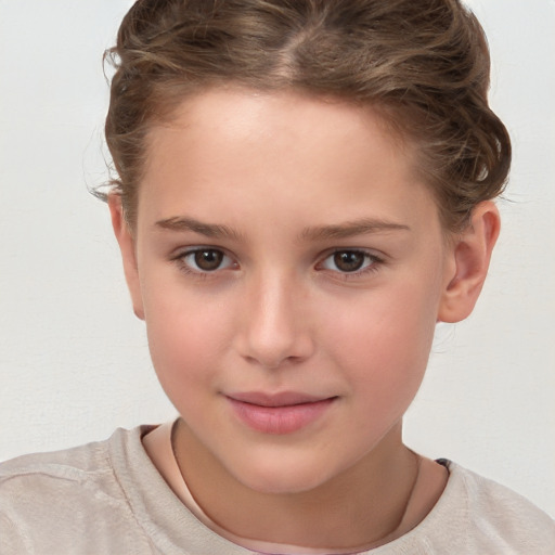 Joyful white child female with short  brown hair and brown eyes