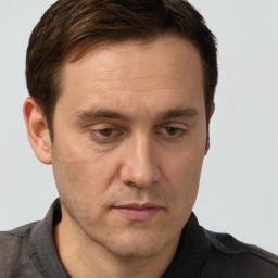 Neutral white adult male with short  brown hair and brown eyes