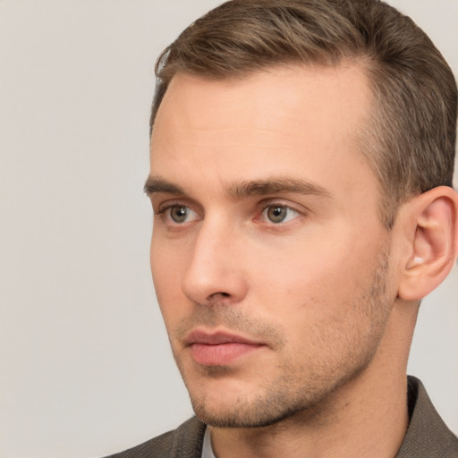 Neutral white young-adult male with short  brown hair and brown eyes