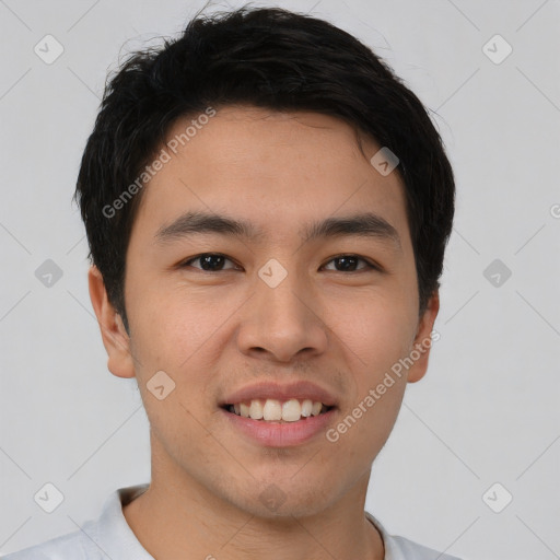 Joyful asian young-adult male with short  black hair and brown eyes