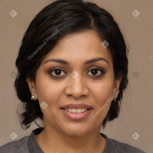 Joyful black young-adult female with medium  brown hair and brown eyes