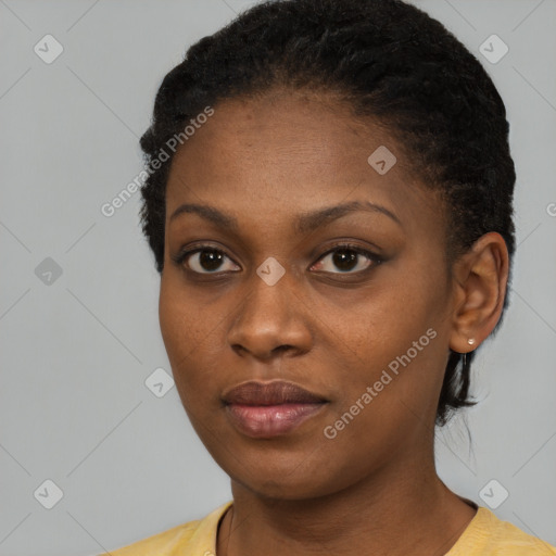 Neutral black young-adult female with short  black hair and brown eyes