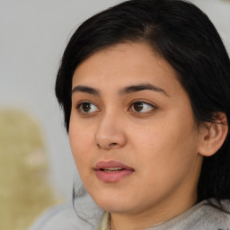 Neutral asian young-adult female with medium  black hair and brown eyes