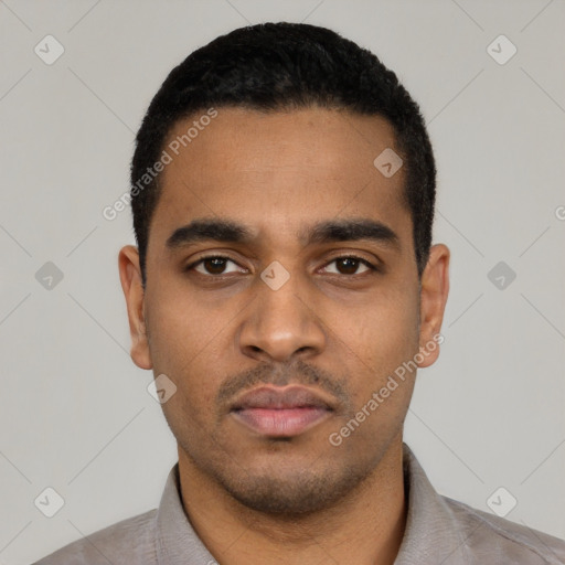 Neutral latino young-adult male with short  black hair and brown eyes