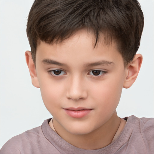 Joyful white child male with short  brown hair and brown eyes