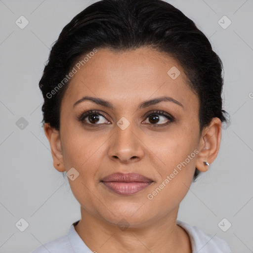 Joyful latino young-adult female with short  brown hair and brown eyes