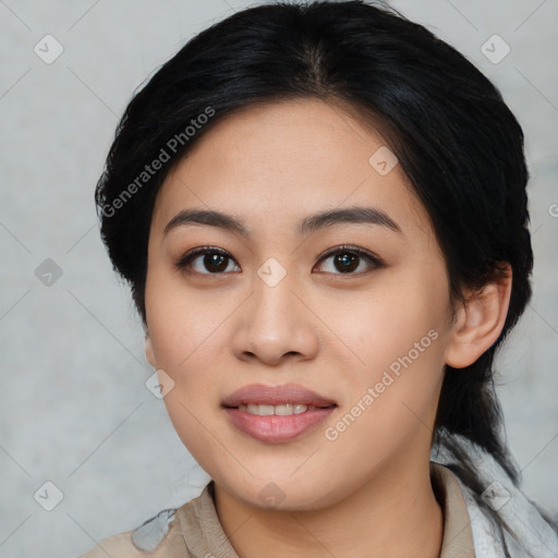 Joyful asian young-adult female with medium  black hair and brown eyes