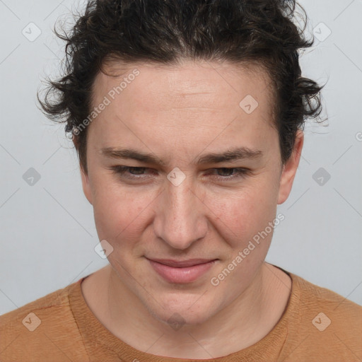 Joyful white adult female with short  brown hair and brown eyes