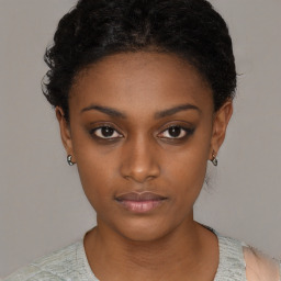 Neutral black young-adult female with short  black hair and brown eyes