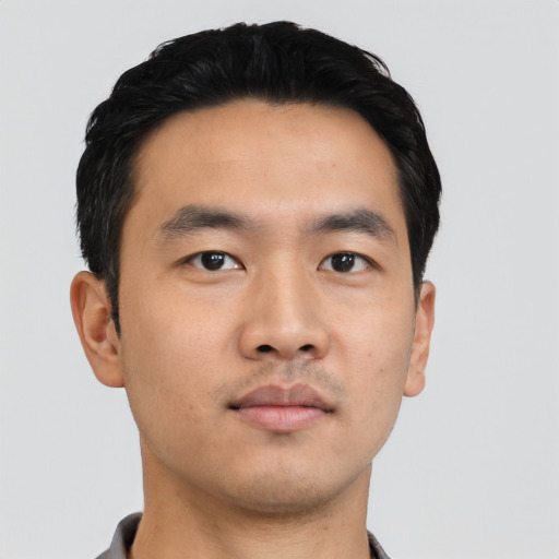 Neutral asian young-adult male with short  black hair and brown eyes
