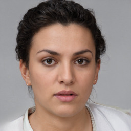 Neutral white young-adult female with short  brown hair and brown eyes