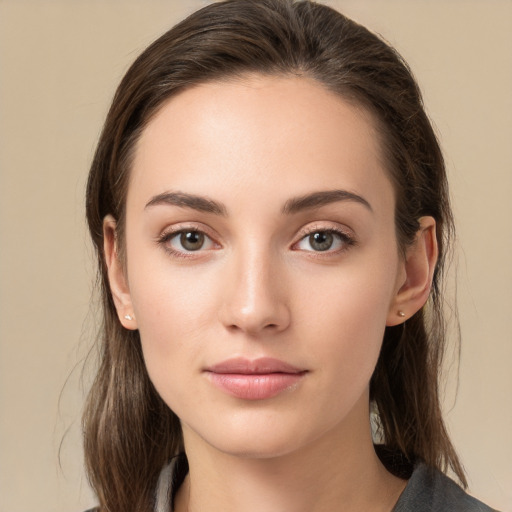 Neutral white young-adult female with medium  brown hair and brown eyes