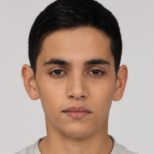 Neutral latino young-adult male with short  black hair and brown eyes