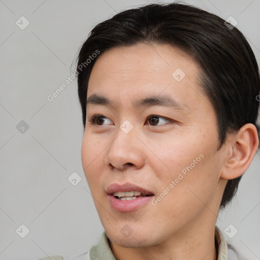 Joyful white young-adult male with medium  brown hair and brown eyes
