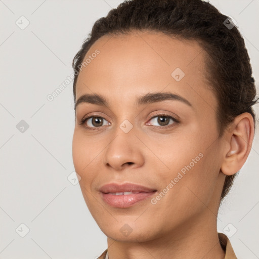 Joyful white young-adult female with short  brown hair and brown eyes