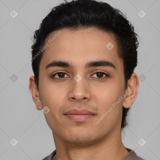 Neutral latino young-adult male with short  black hair and brown eyes