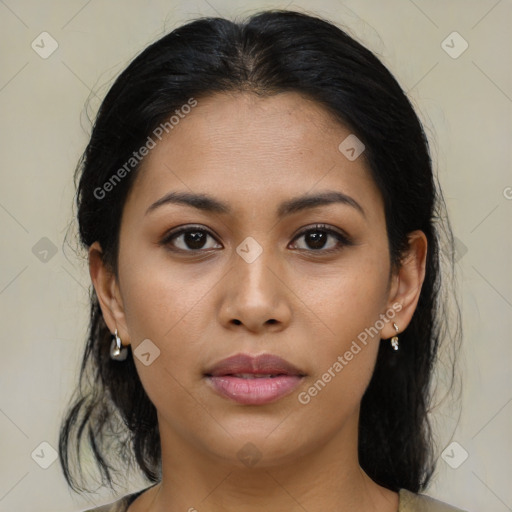 Joyful latino young-adult female with medium  brown hair and brown eyes