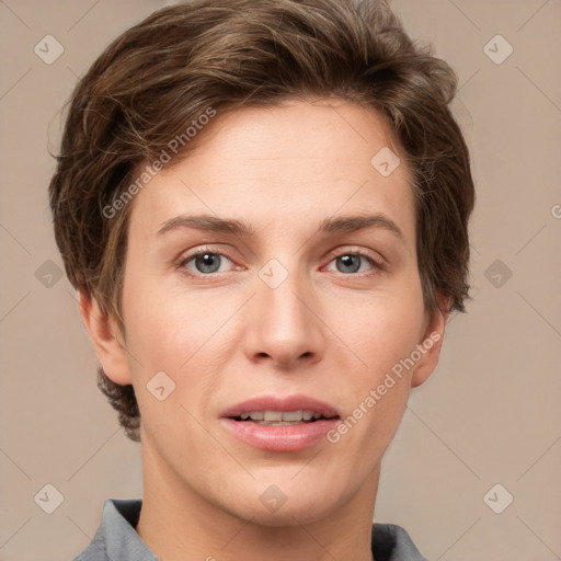 Joyful white young-adult female with short  brown hair and grey eyes