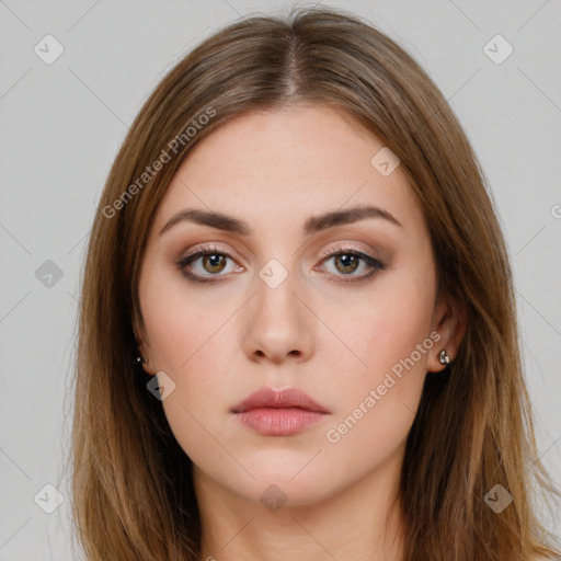 Neutral white young-adult female with long  brown hair and brown eyes