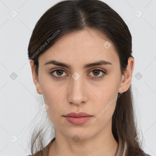 Neutral white young-adult female with long  brown hair and brown eyes