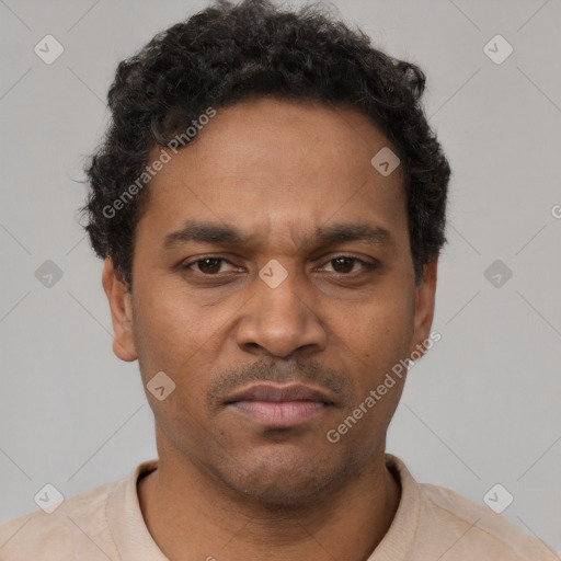 Neutral latino young-adult male with short  brown hair and brown eyes