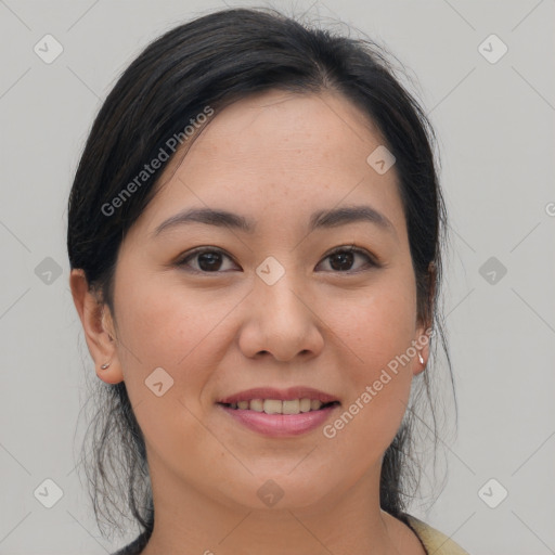 Joyful asian young-adult female with medium  brown hair and brown eyes