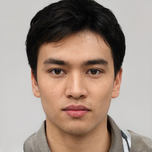 Neutral asian young-adult male with short  black hair and brown eyes