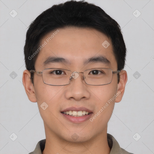 Joyful asian young-adult male with short  brown hair and brown eyes