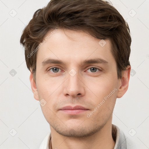 Neutral white young-adult male with short  brown hair and grey eyes