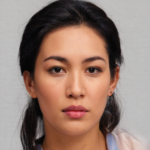Neutral asian young-adult female with medium  black hair and brown eyes