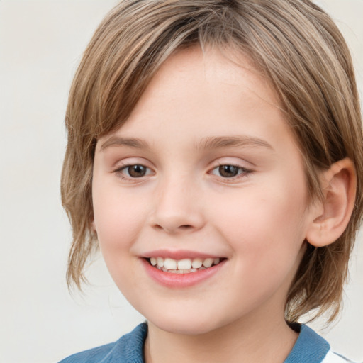 Joyful white child female with medium  brown hair and grey eyes