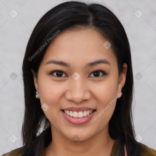 Joyful asian young-adult female with long  brown hair and brown eyes