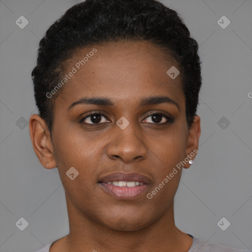 Joyful black young-adult female with short  brown hair and brown eyes