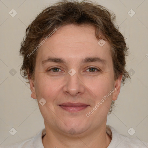 Joyful white adult female with short  brown hair and brown eyes