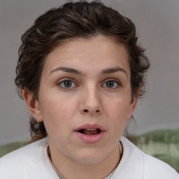 Neutral white young-adult female with short  brown hair and brown eyes