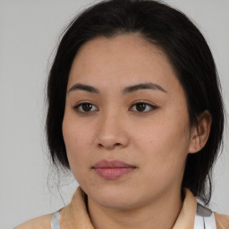 Neutral asian young-adult female with medium  brown hair and brown eyes