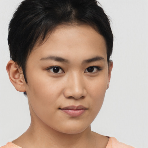 Joyful asian young-adult female with short  brown hair and brown eyes