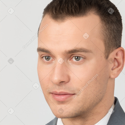 Neutral white young-adult male with short  brown hair and brown eyes