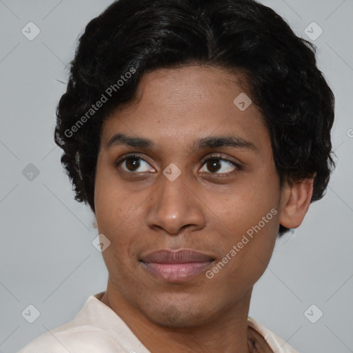 Joyful latino young-adult male with short  brown hair and brown eyes