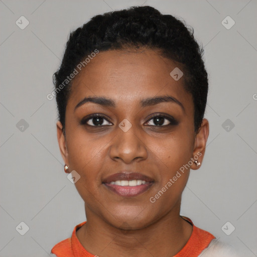 Joyful black young-adult female with short  black hair and brown eyes