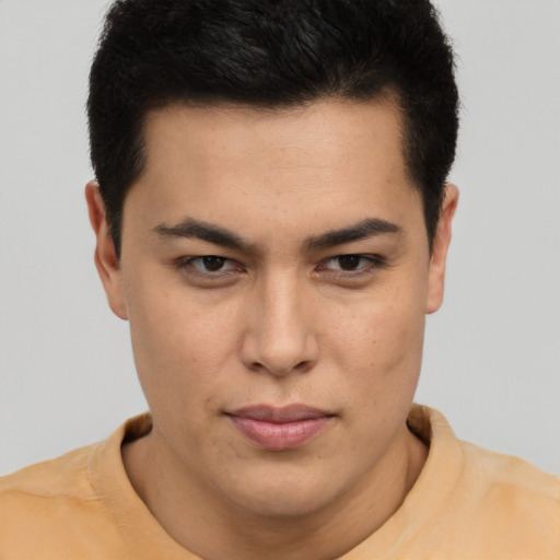 Neutral latino young-adult male with short  brown hair and brown eyes