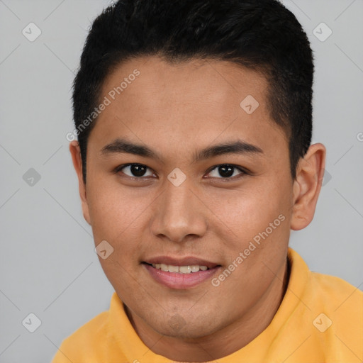 Joyful asian young-adult male with short  brown hair and brown eyes