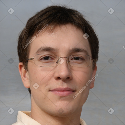 Joyful white adult male with short  brown hair and brown eyes